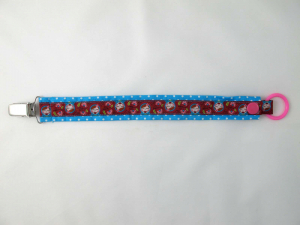 Nuggibändel türkis mit Matruska (pink)